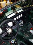 Interior of Mite wiht sterring wheel and windshield